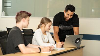 Rio graduate in the classroom teaching math to secondary education students