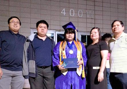 photo of the Nguyen family at Helen's college graduation