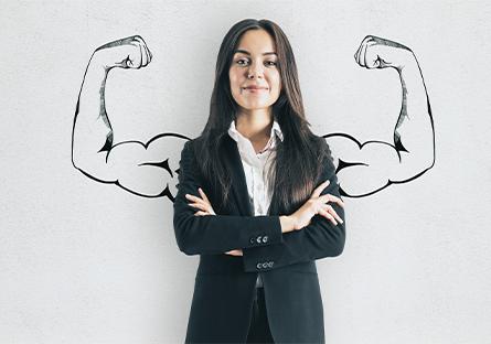 Portrait of attractive young businesswoman with drawn muscly arms. Confidence and strength concept