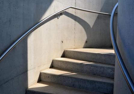 Curved staircase with handrail