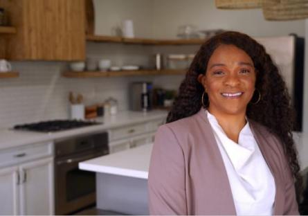 Jae Dillard standing in a kitchen