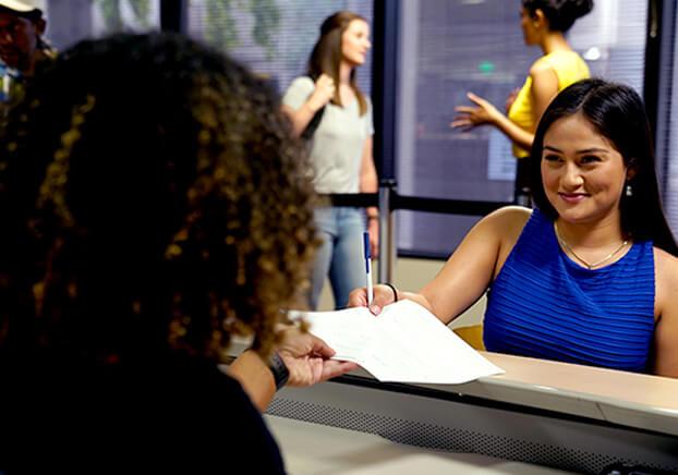 Student in front of counter